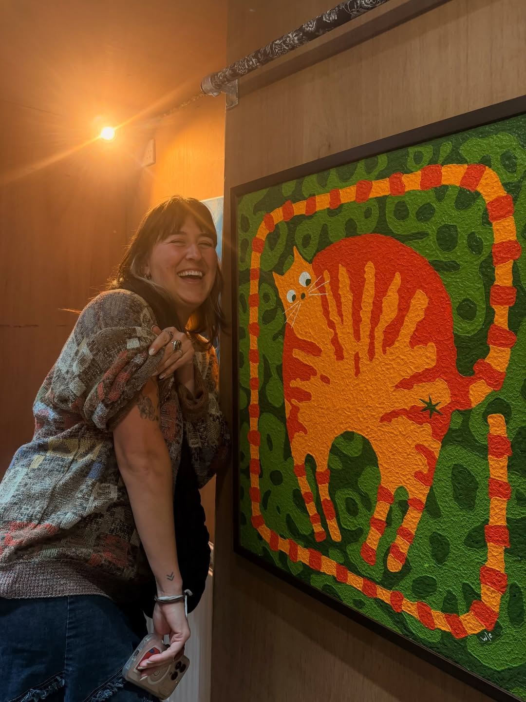A laughing gallery visitor