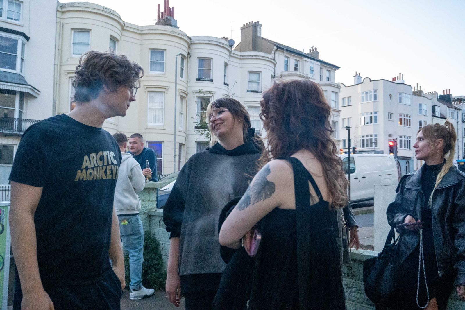 Guests chatting outside a Brighton gallery